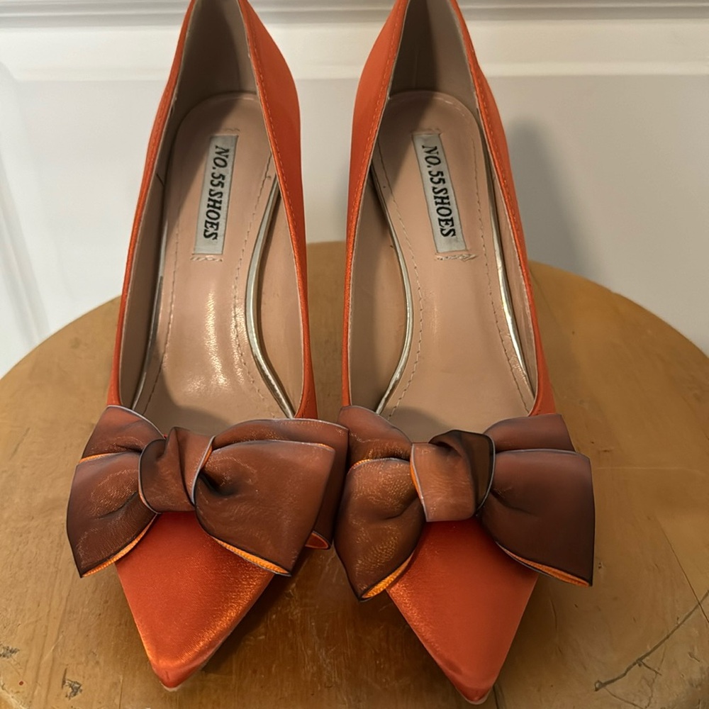 Orange and gold pumps